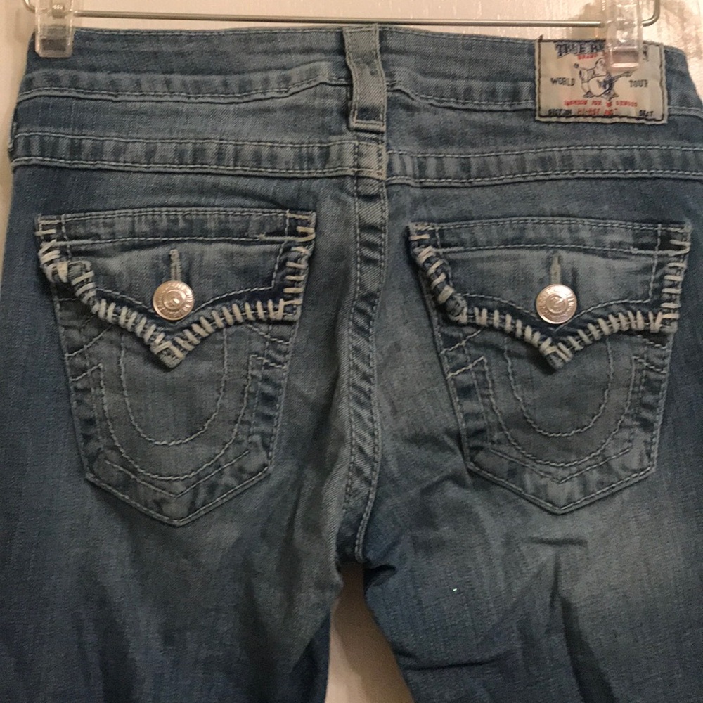 Lightly distressed blue jeans